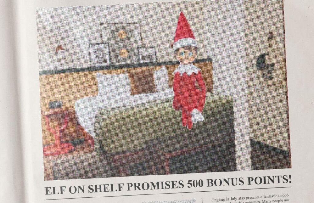 jingle all july elf on a bed in king suite