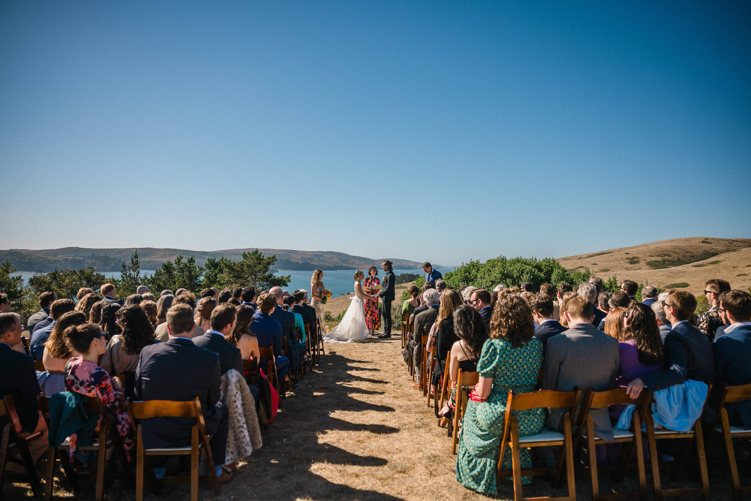 Photo of wedding ceremony on top of Tower Hill overlooking Tomales Bay