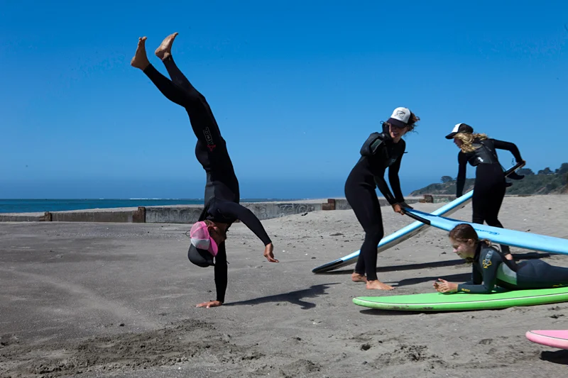 surfers on the beach